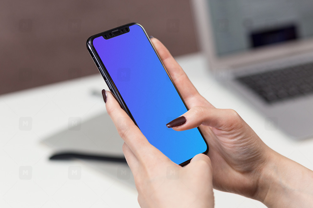 Woman typing on iPhone X mockup