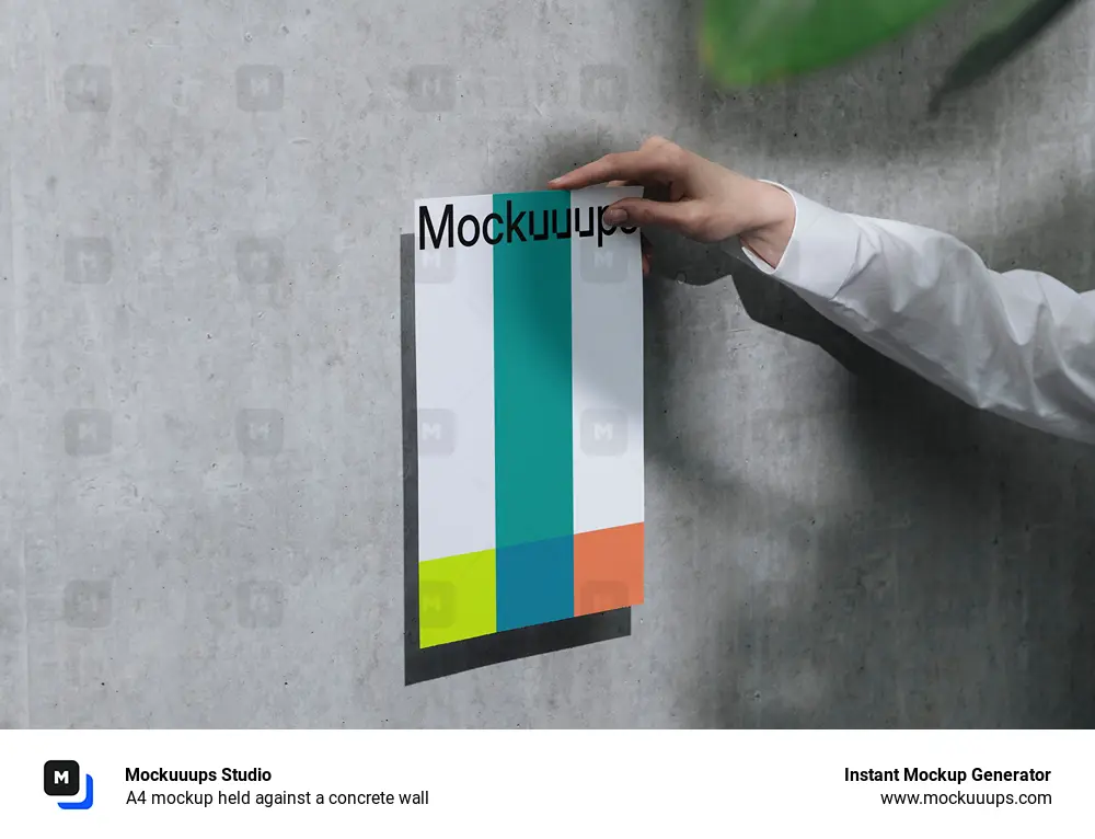 A4 mockup held against a concrete wall