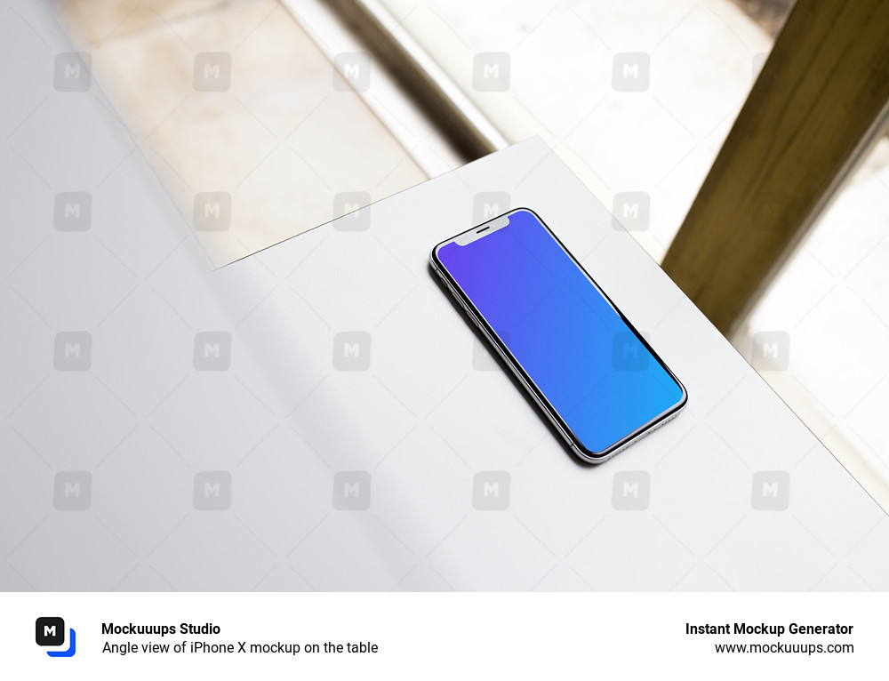 Angle view of iPhone X mockup on the table