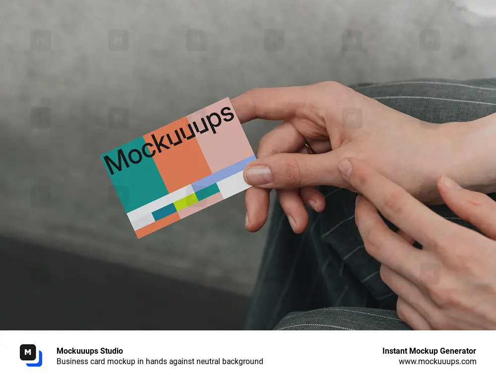 Business card mockup in hands against neutral background