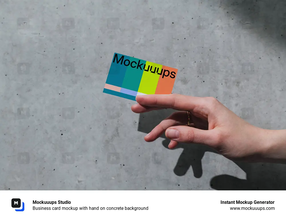 Business card mockup with hand on concrete background