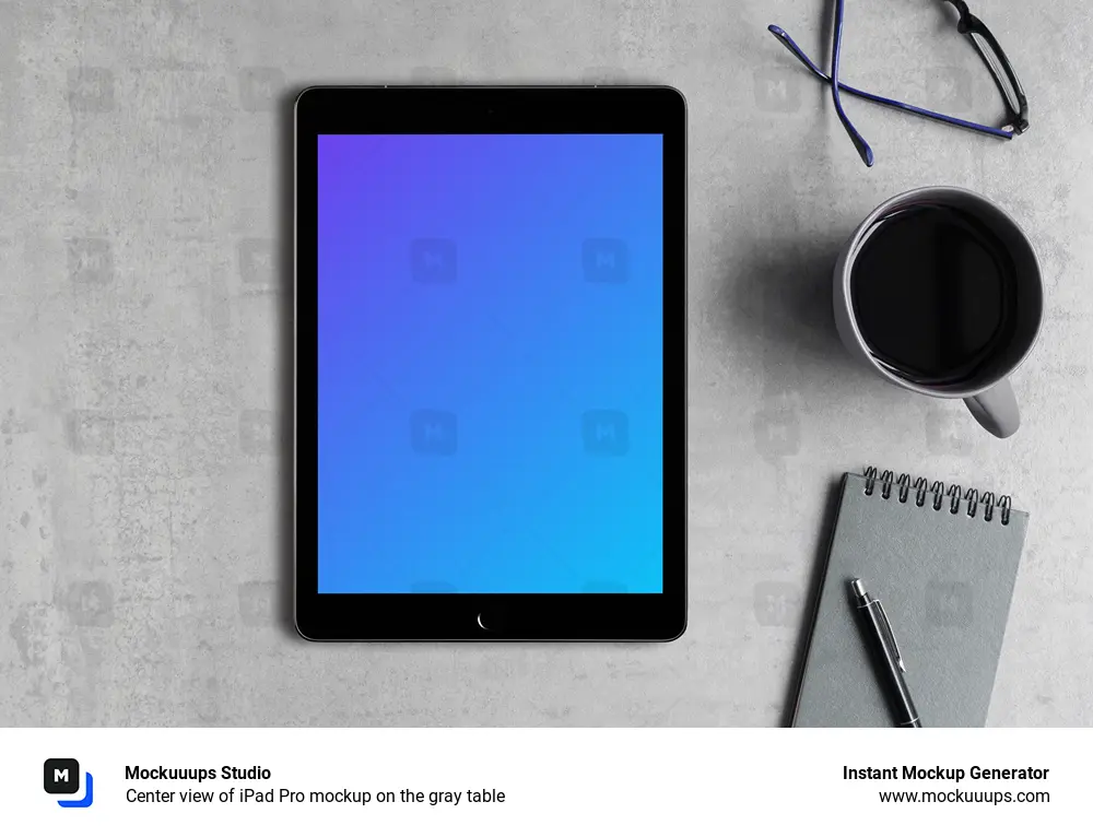 Center view of iPad Pro mockup on the gray table