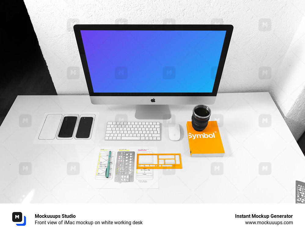 Front view of iMac mockup on white working desk