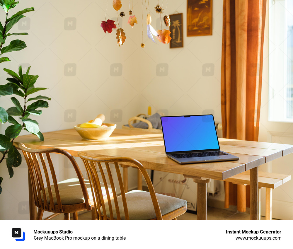 Grey MacBook Pro mockup on a dining table