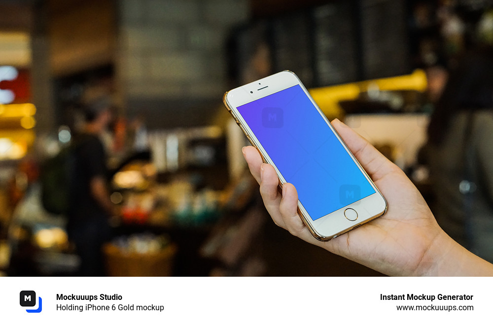 Holding iPhone 6 Gold mockup