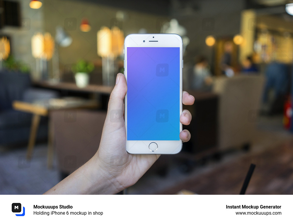 Holding iPhone 6 mockup in shop