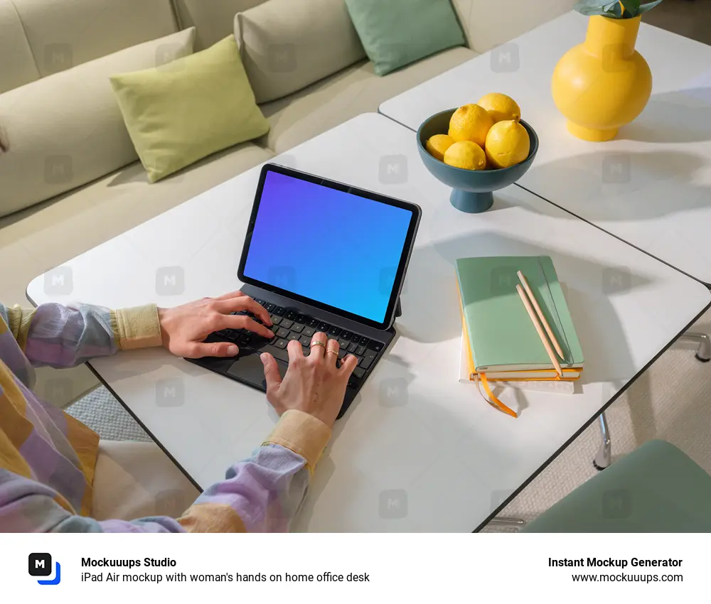 iPad Air mockup with woman's hands on home office desk