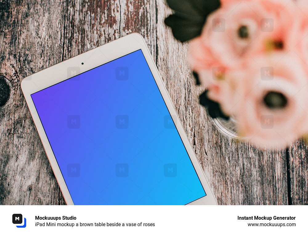iPad Mini mockup a brown table beside a vase of roses