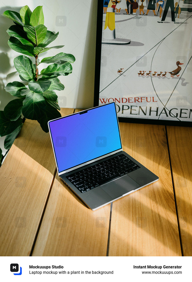 Laptop mockup with a plant in the background