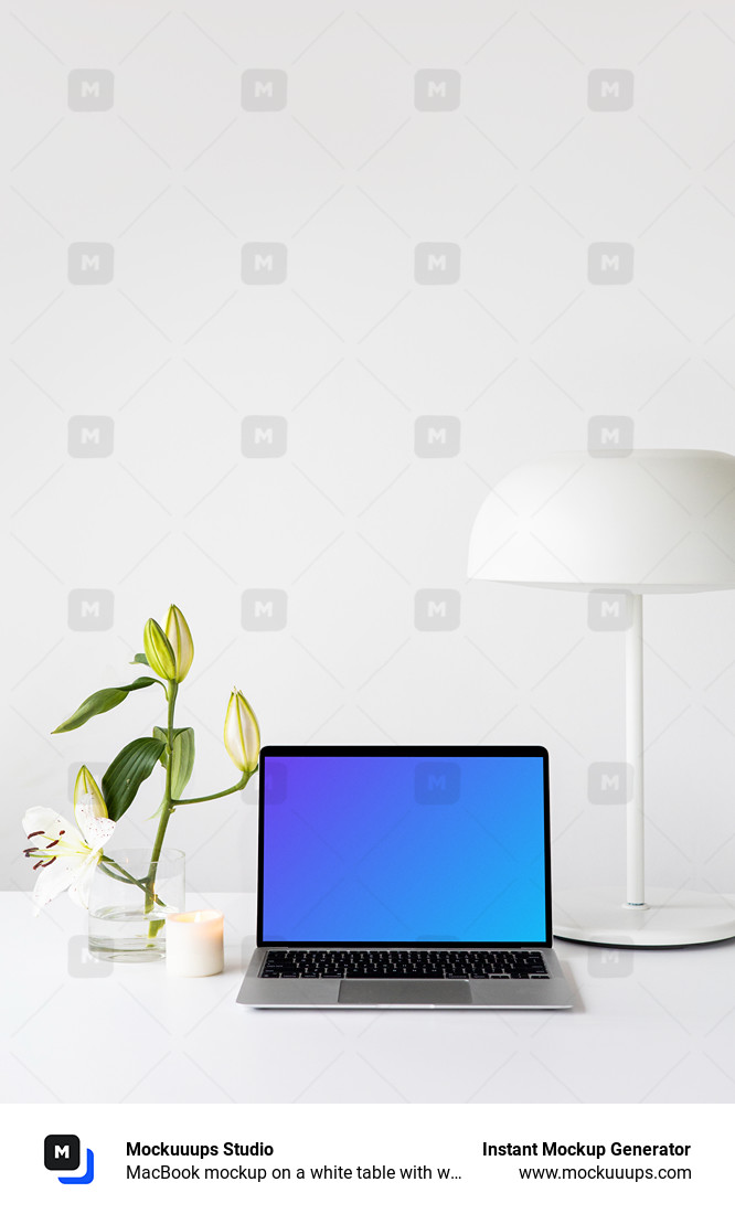 MacBook mockup on a white table with white table lamp at the side