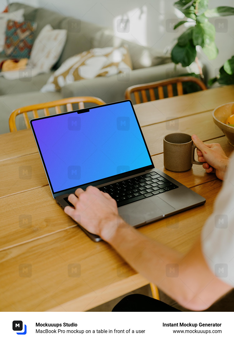 MacBook Pro mockup on a table in front of a user