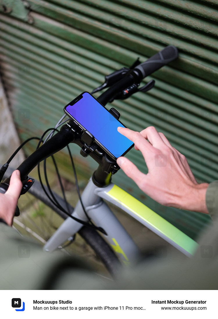 Man on bike next to a garage with iPhone 11 Pro mockup in bike mount