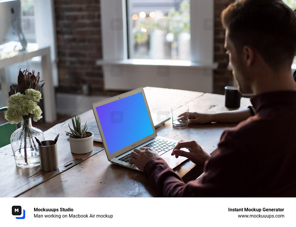 Man working on Macbook Air mockup