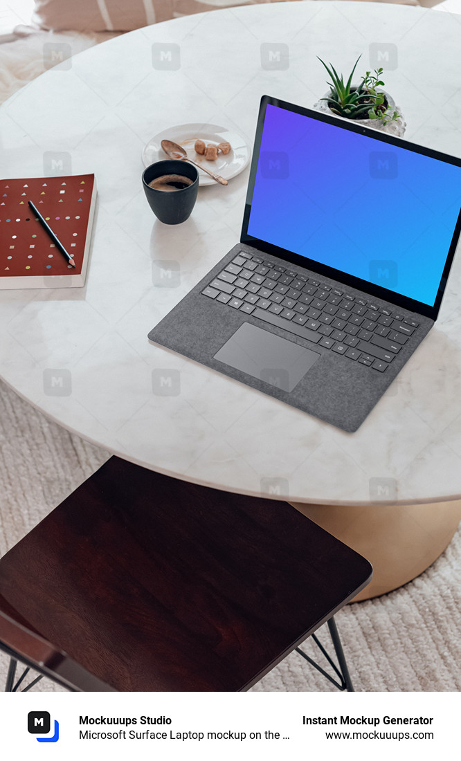 Microsoft Surface Laptop mockup on the marble table