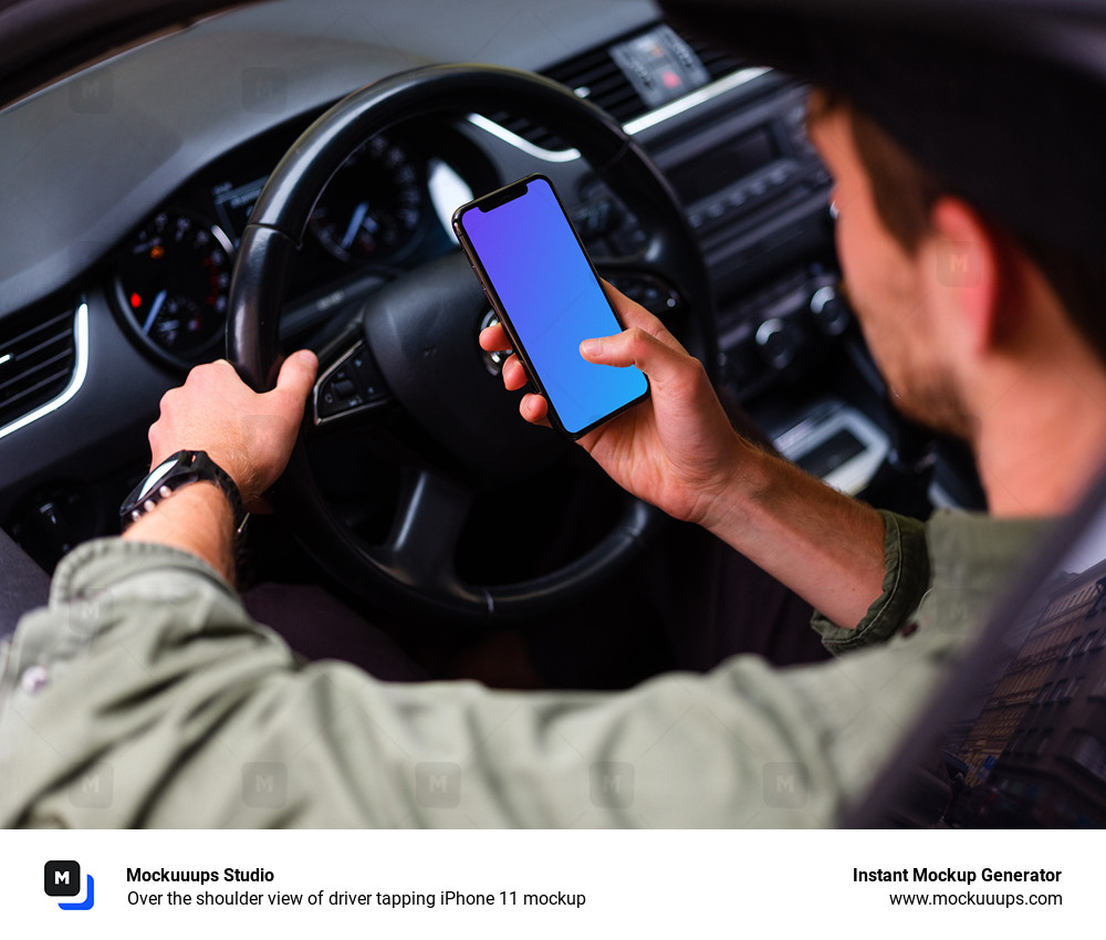 Over the shoulder view of driver tapping iPhone 11 mockup