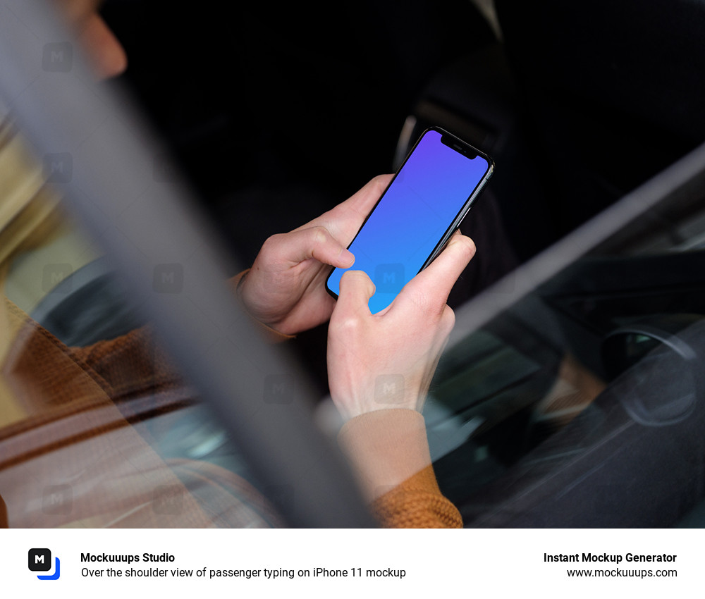 Over the shoulder view of passenger typing on iPhone 11 mockup