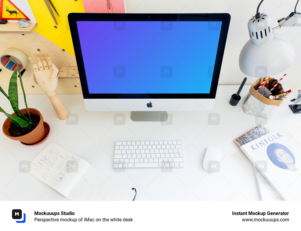 Perspective mockup of iMac on the white desk