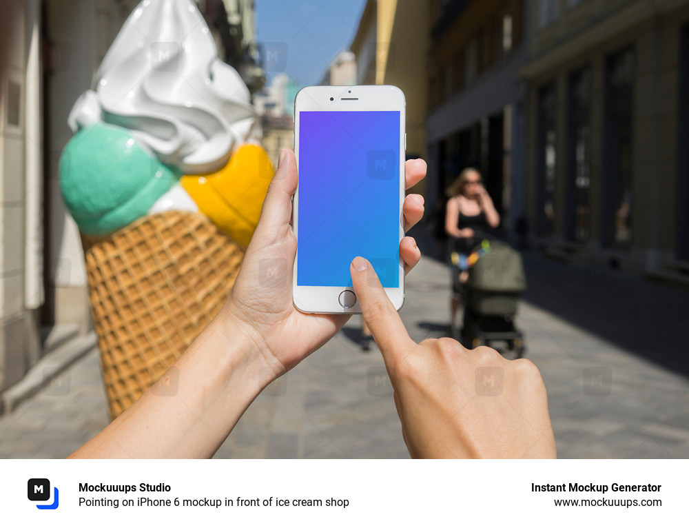 Pointing on iPhone 6 mockup in front of ice cream shop