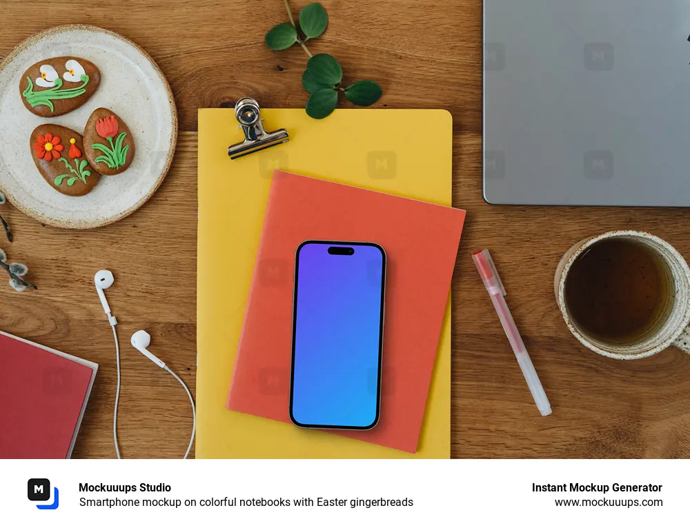 Smartphone mockup on colorful notebooks with Easter gingerbreads