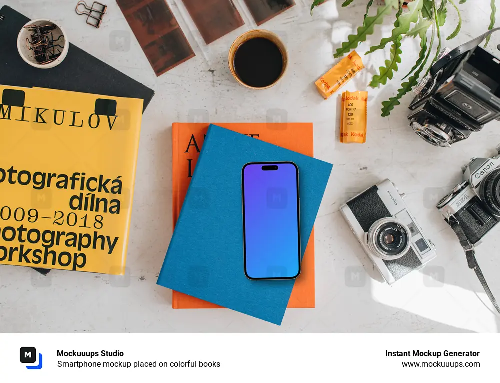 Smartphone mockup placed on colorful books