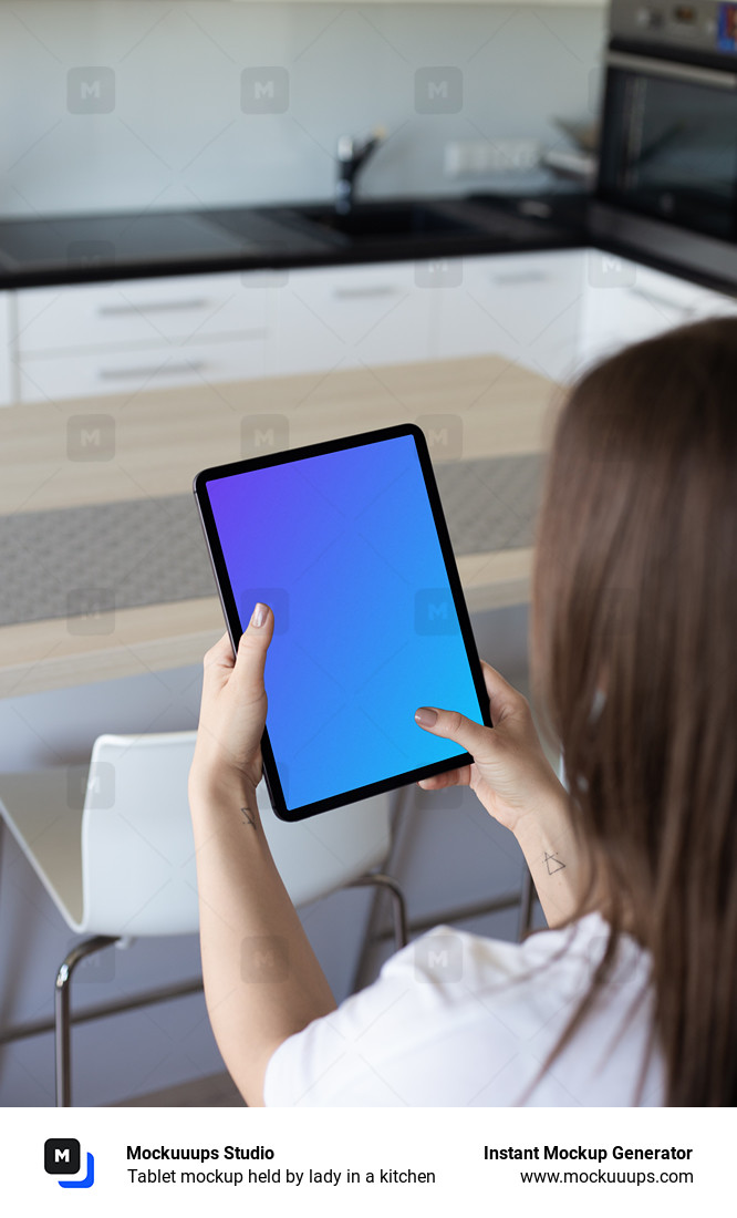 Tablet mockup held by lady in a kitchen