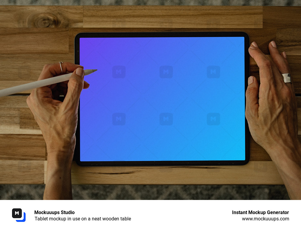 Tablet mockup in use on a neat wooden table