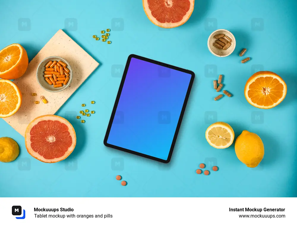 Tablet mockup with oranges and pills