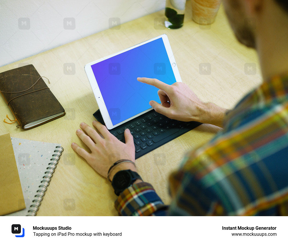 Tapping on iPad Pro mockup with keyboard