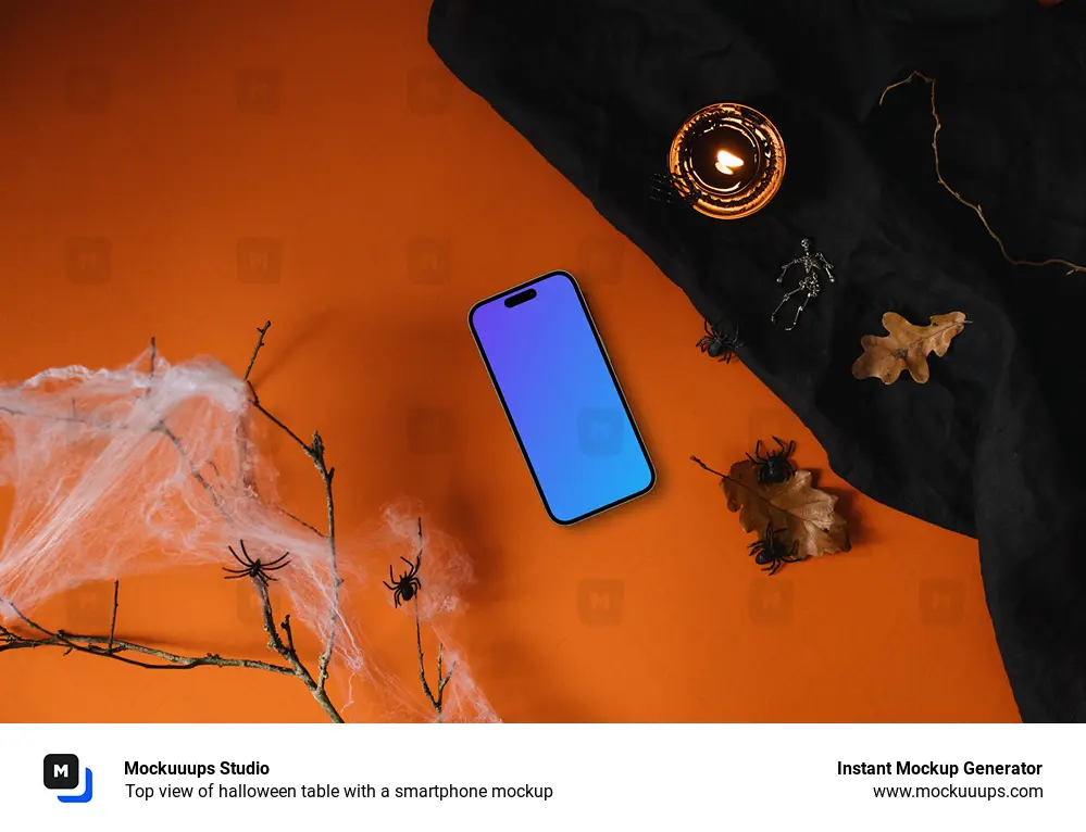 Top view of halloween table with a smartphone mockup