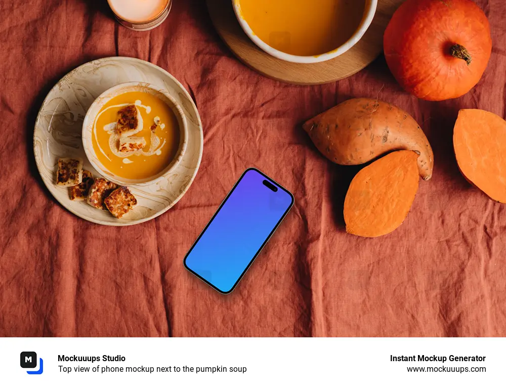 Top view of phone mockup next to the pumpkin soup