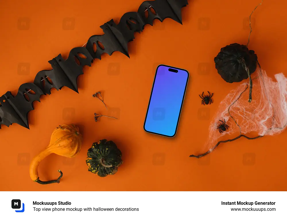Top view phone mockup with halloween decorations
