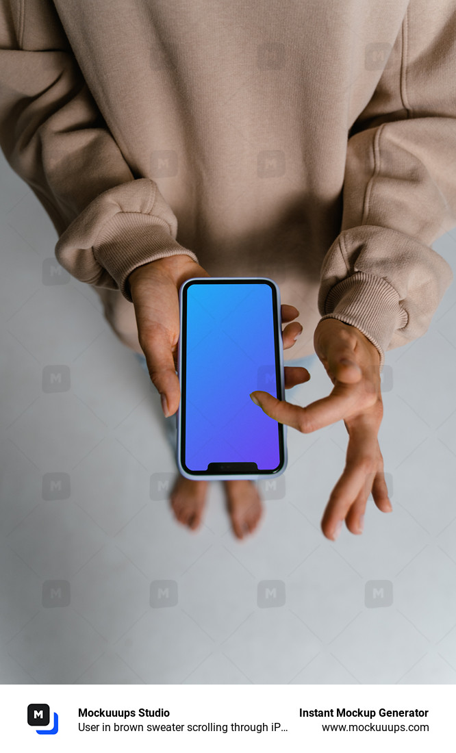 User in brown sweater scrolling through iPhone mockup