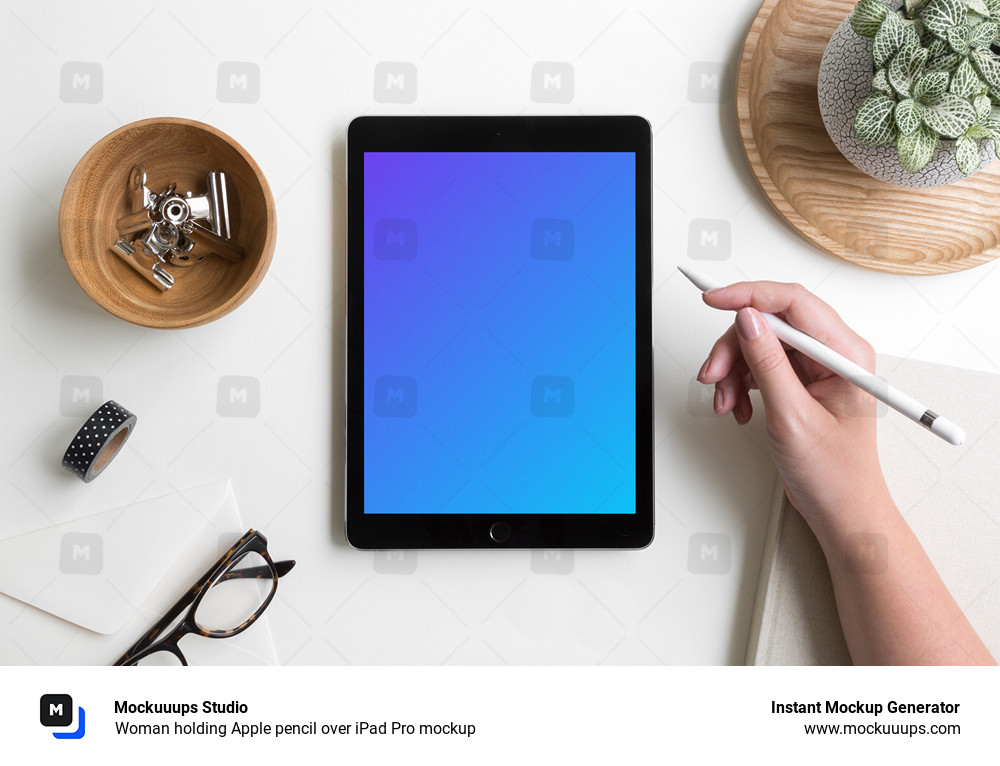 Woman holding Apple pencil over iPad Pro mockup