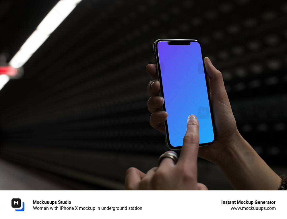 Woman with iPhone X mockup in underground station