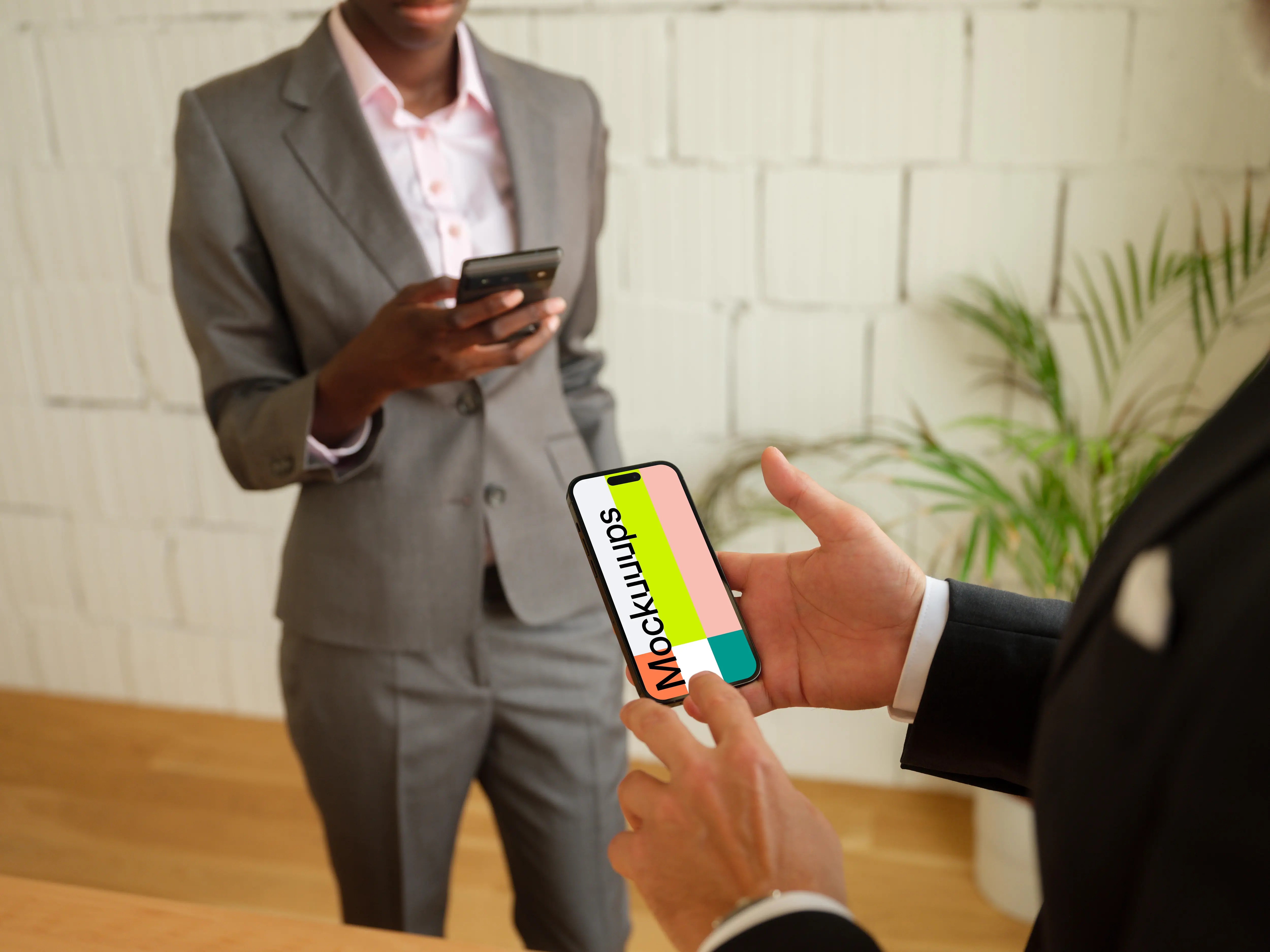 Businessman typing on a iPhone mockup