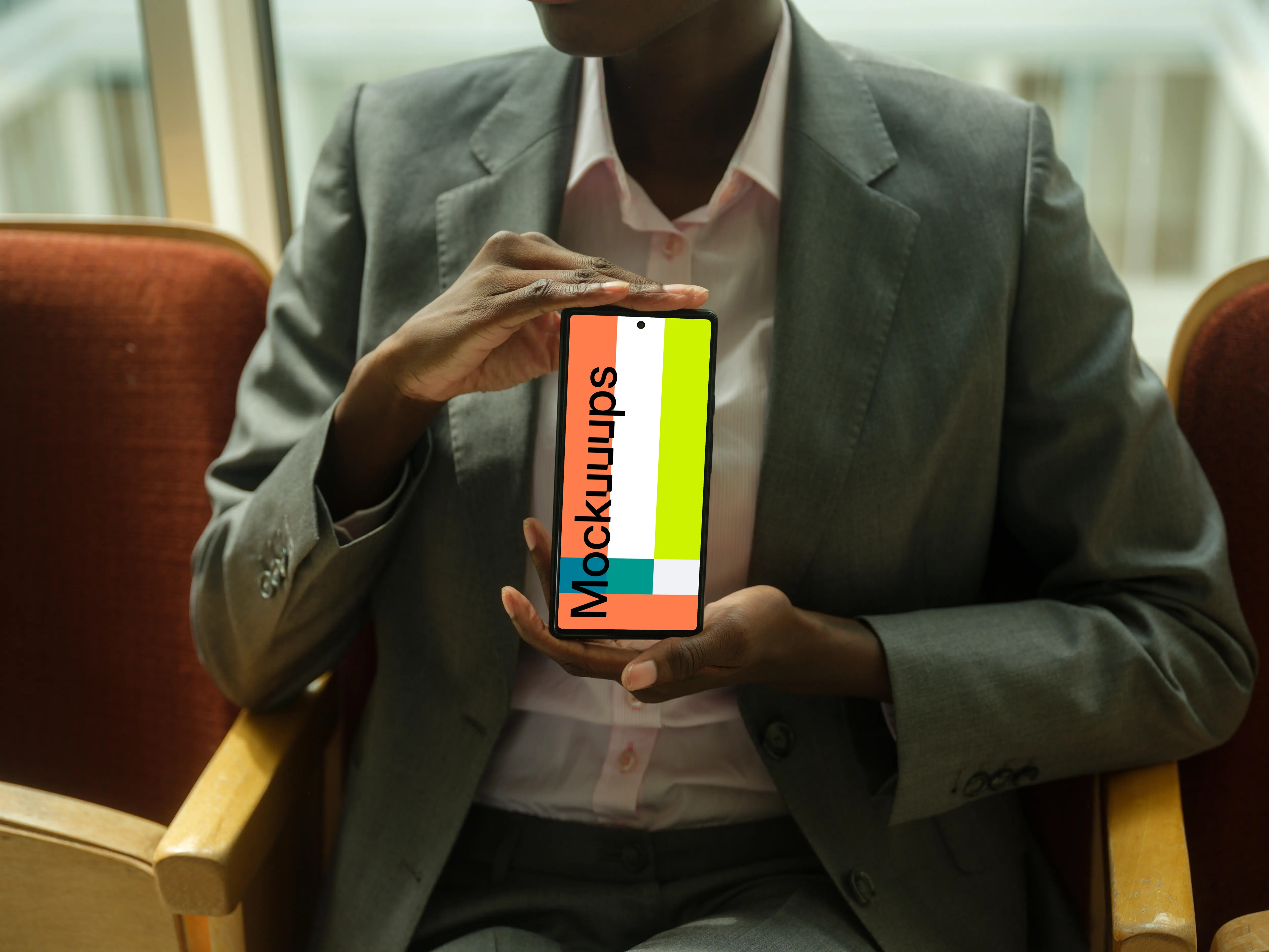 Businesswoman in suit with Google Pixel mockup