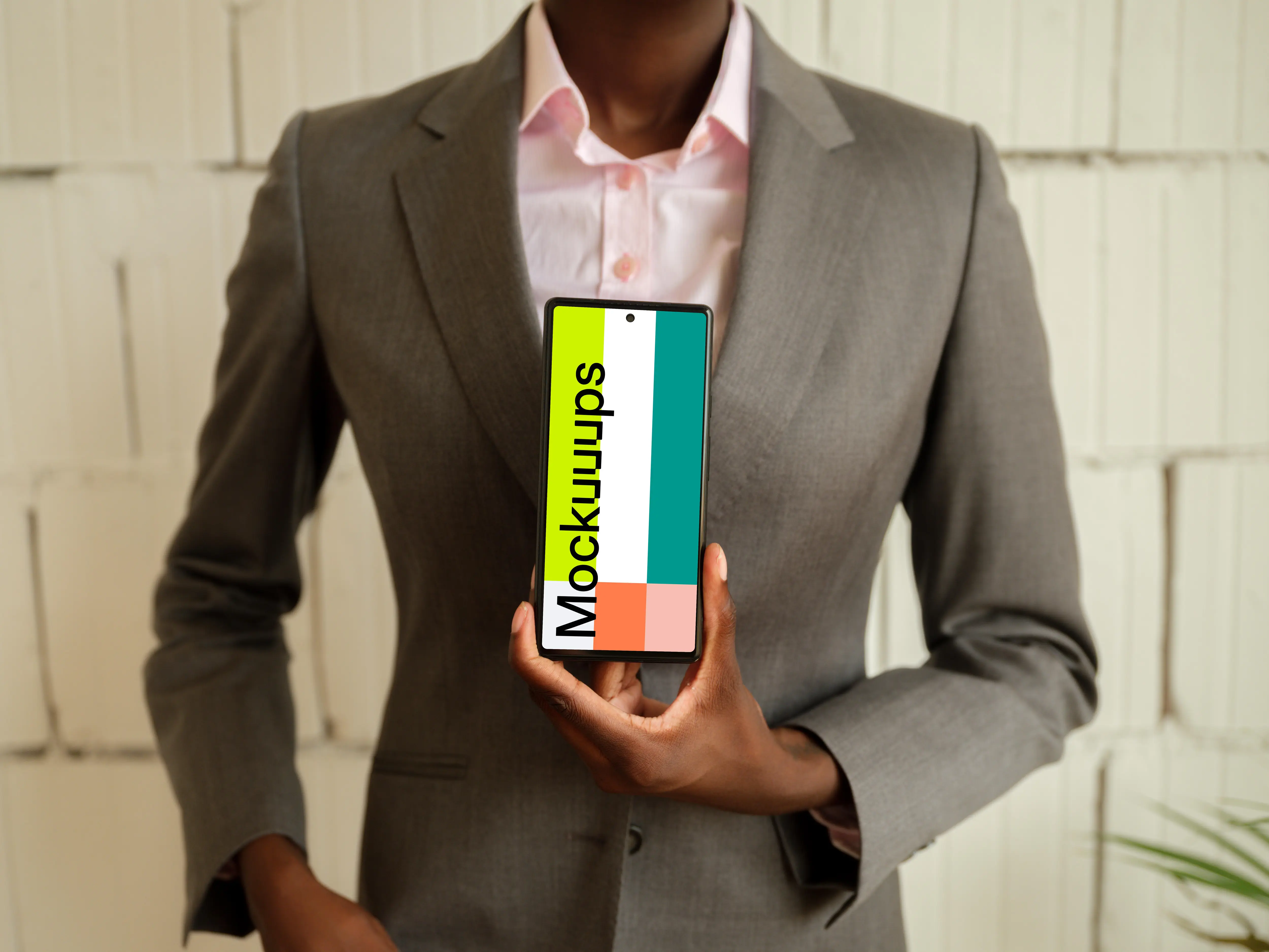 Businesswoman with phone in the office workspace