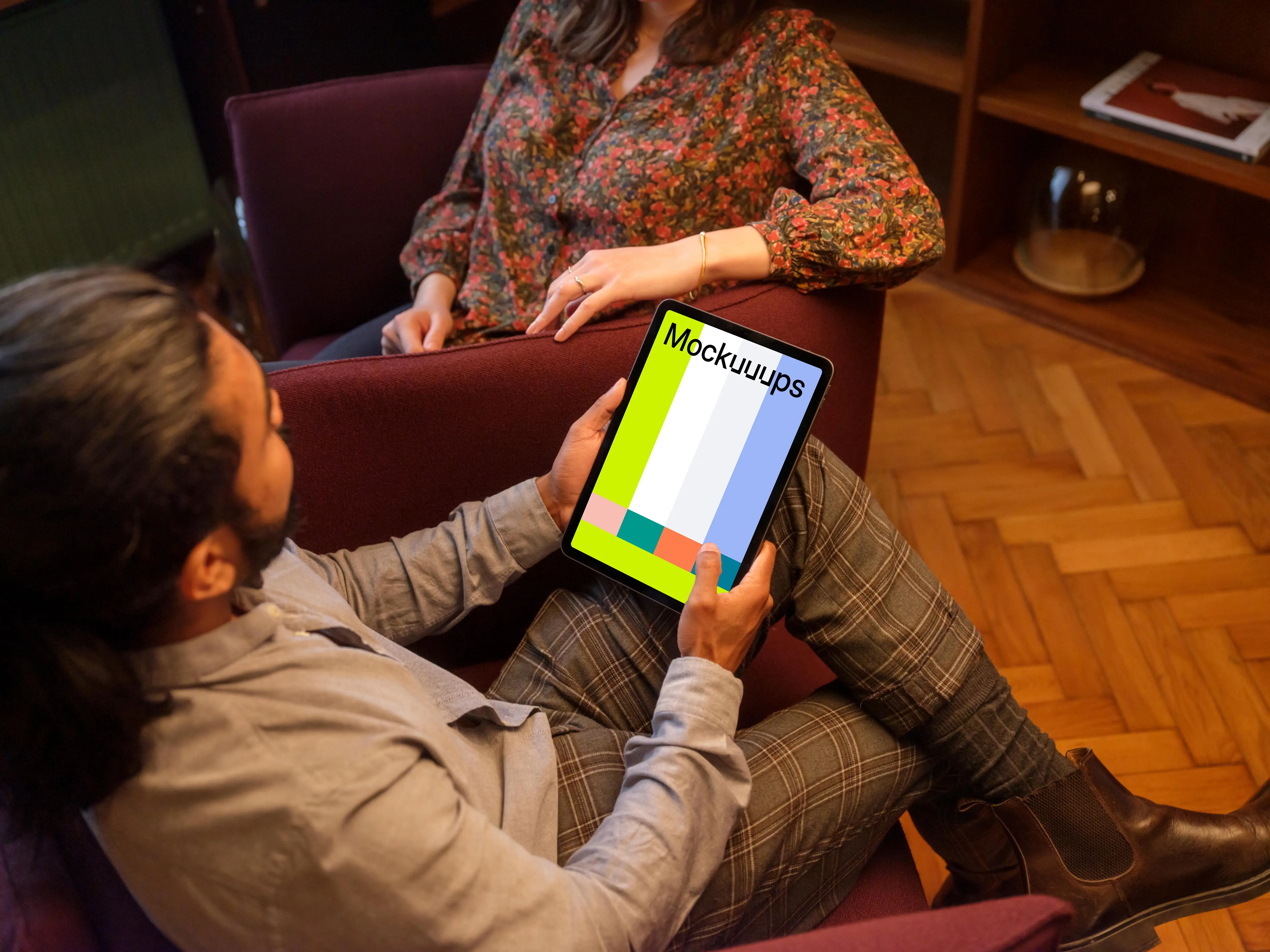 Co-workers in the office with iPad mockup