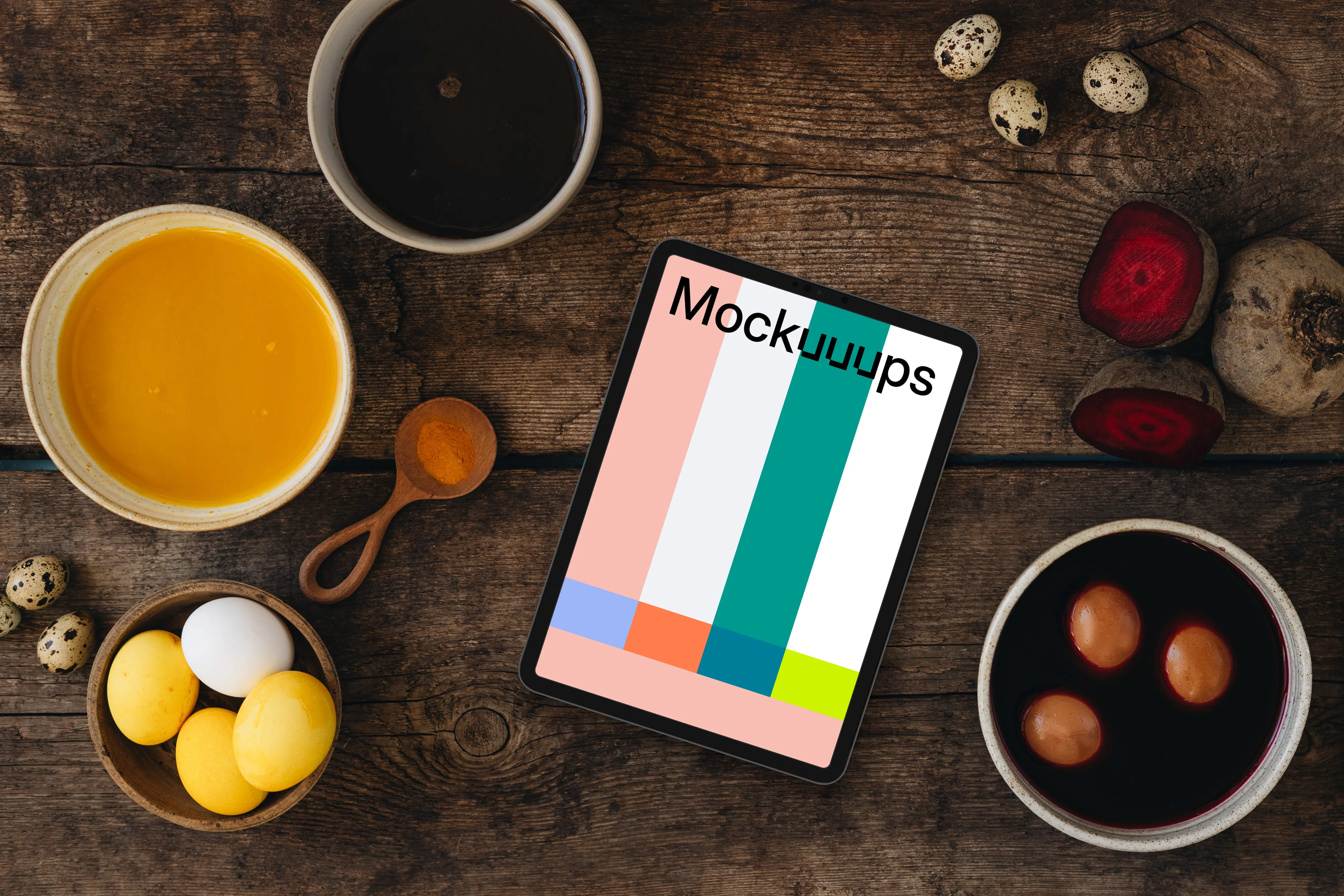 Coloring Easter eggs around tablet mockup