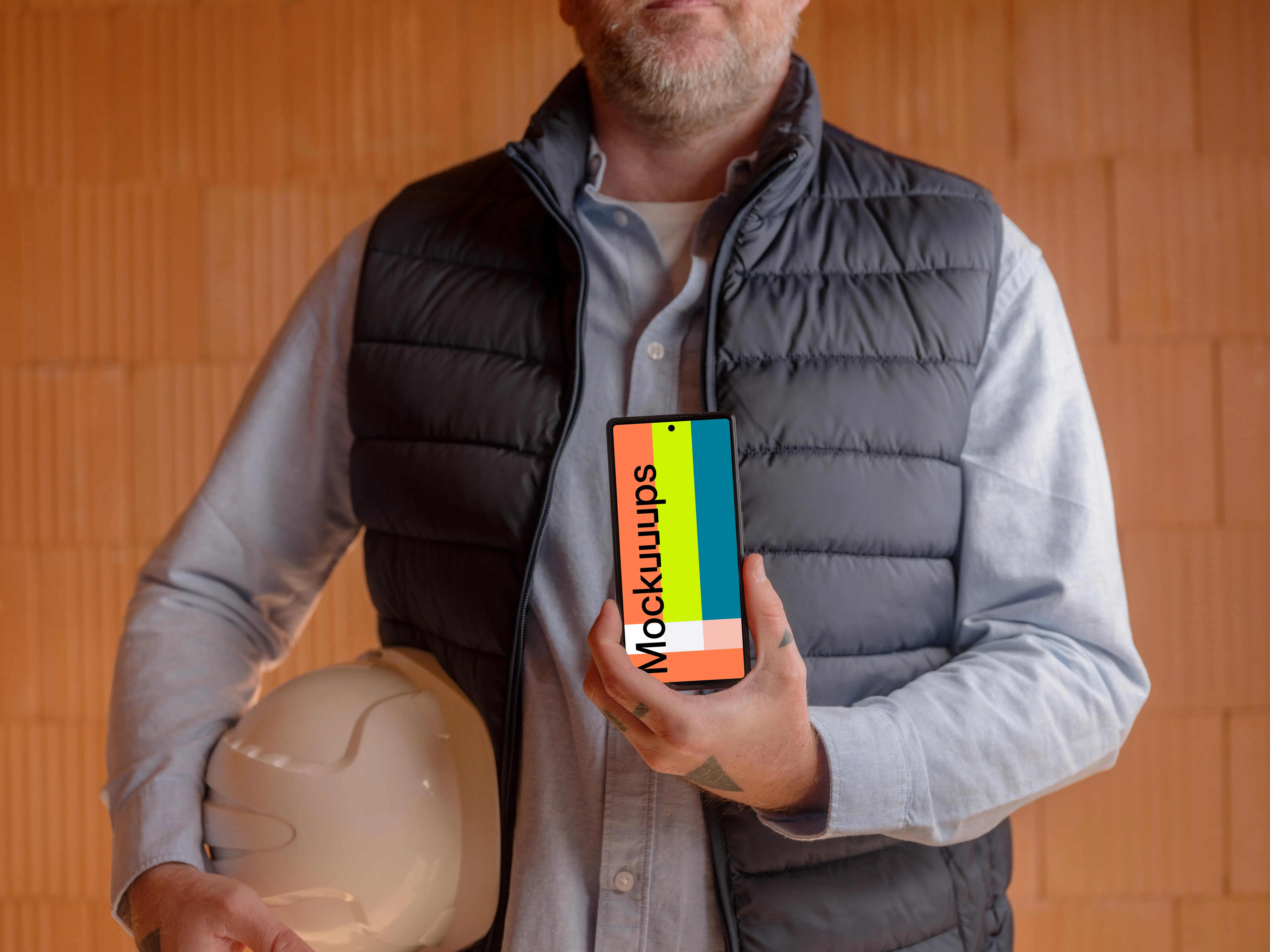 Construction worker, a helmet and a Google Pixel mockup