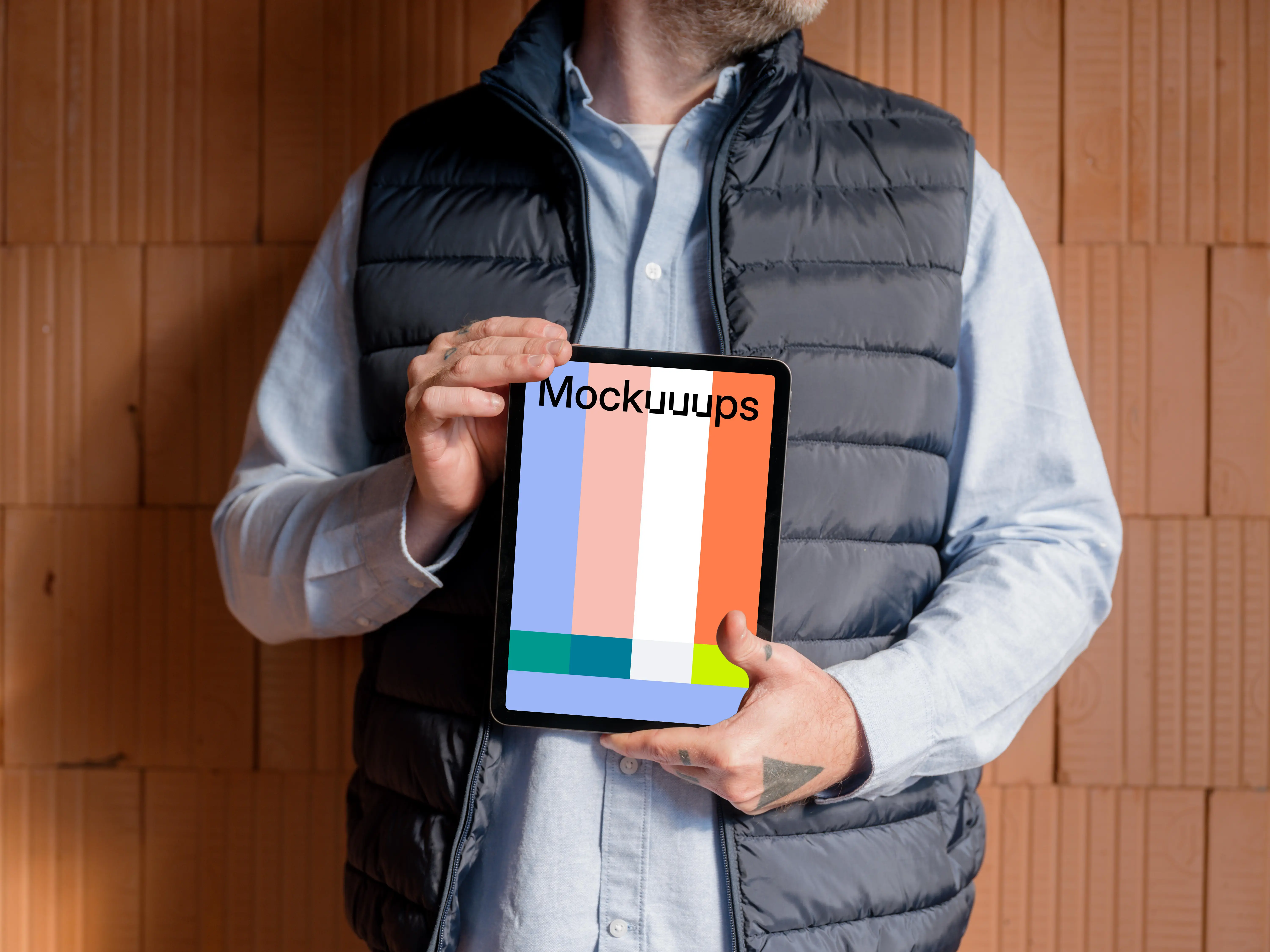 Construction worker confidently holding an iPad mockup