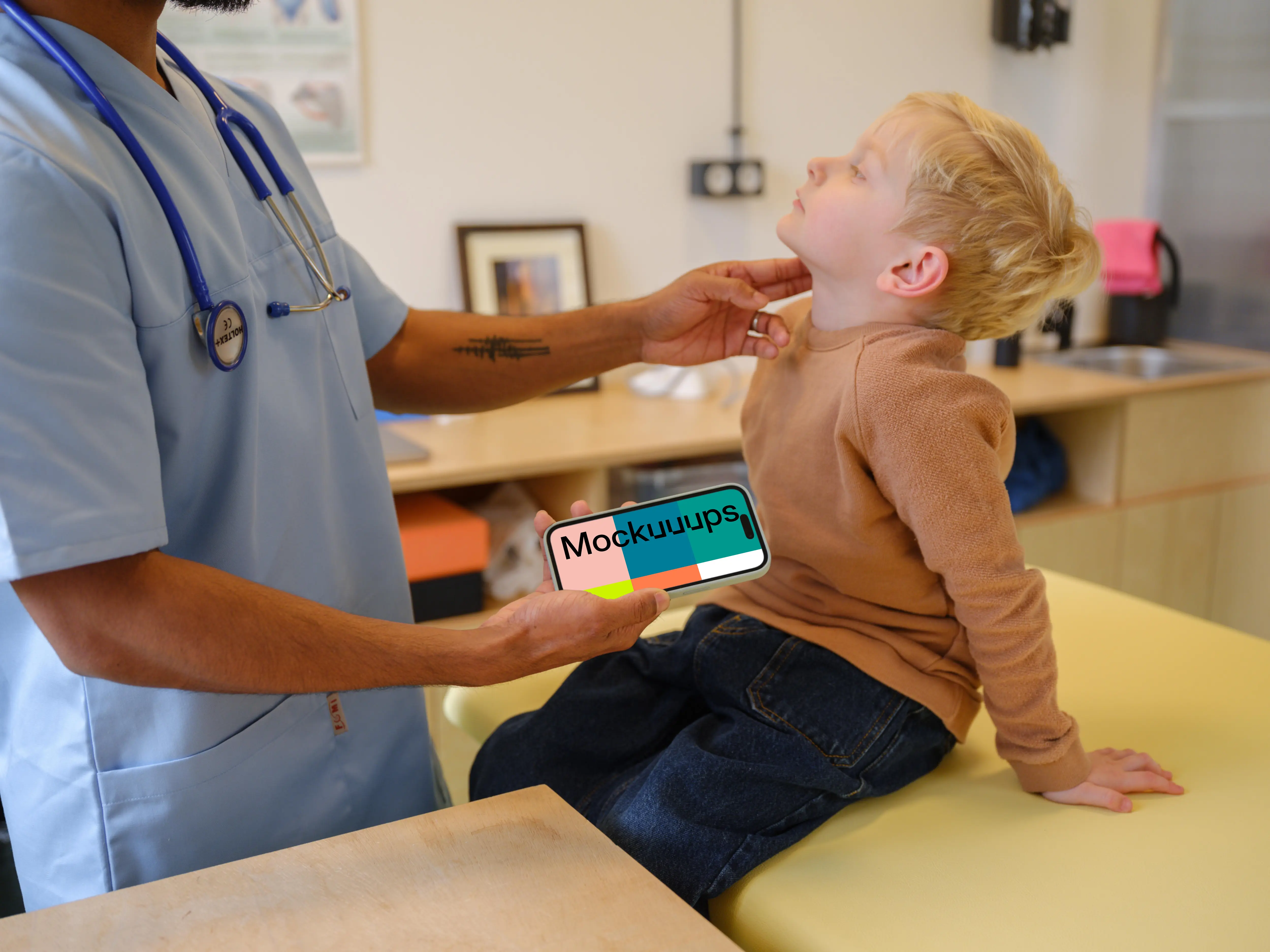 Doctor holding an iPhone mockup next to the child
