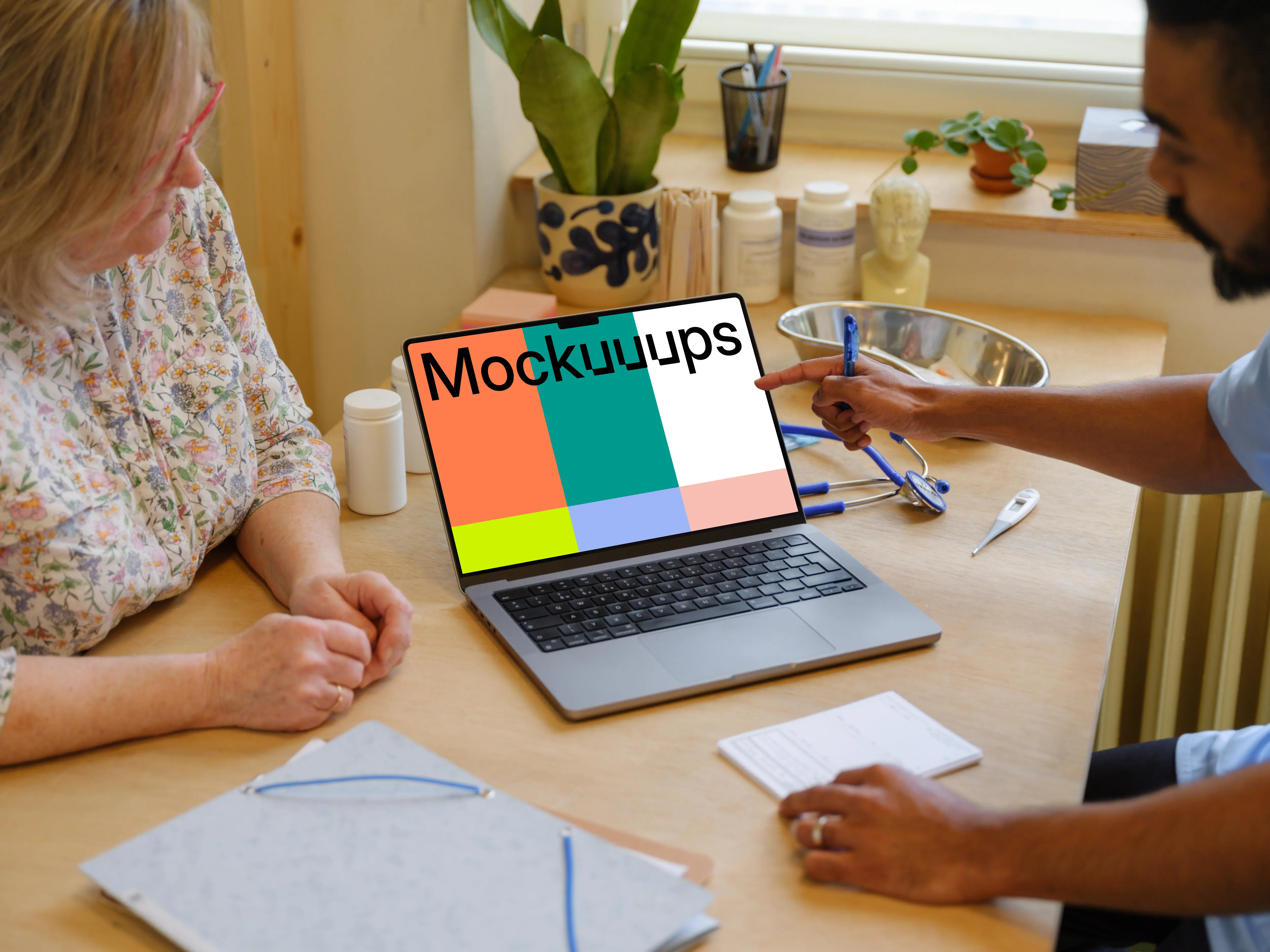 Doctor pointing to MacBook Pro 14" mockup