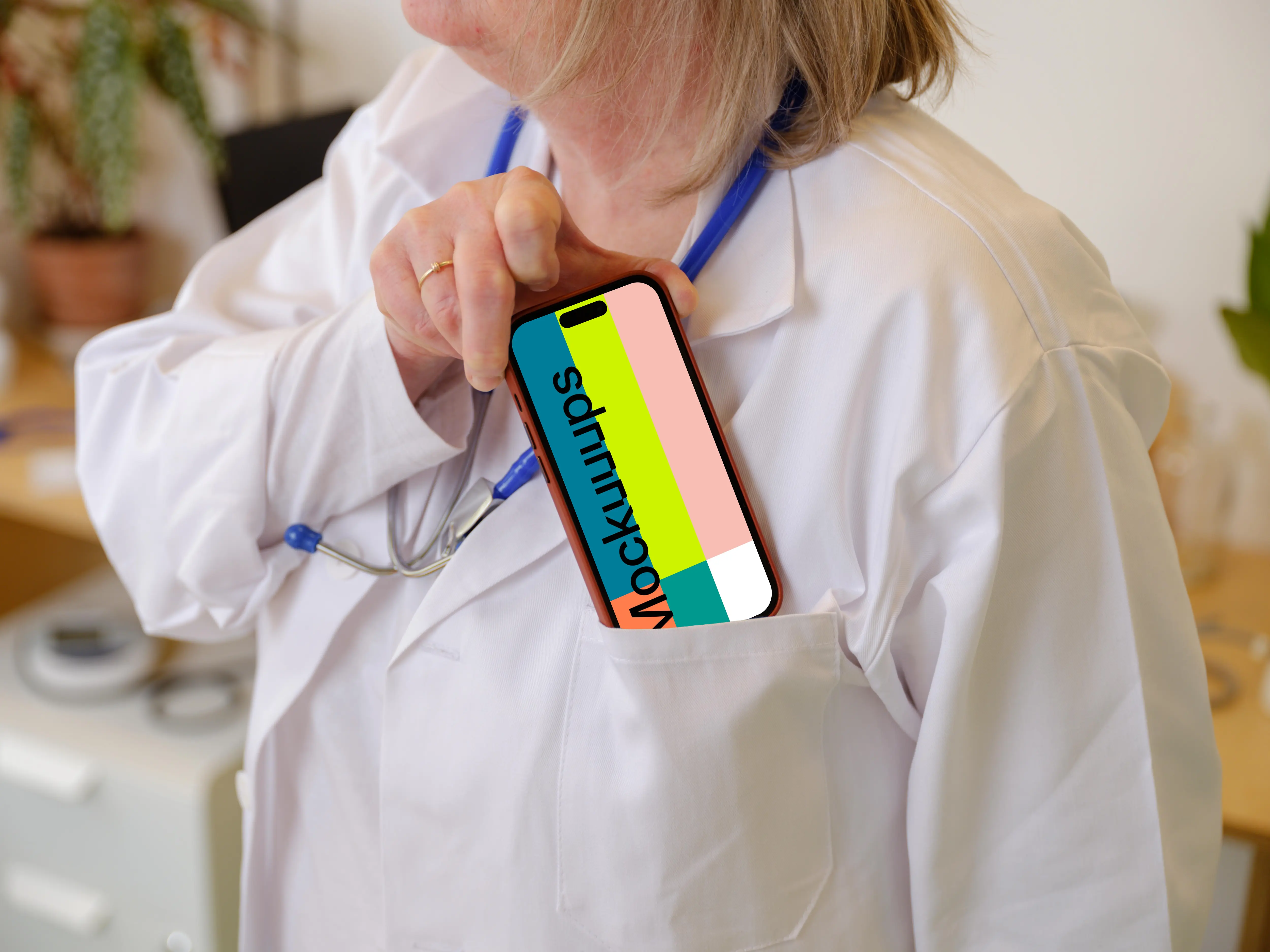 Doctor taking iPhone 14 Pro from her pocket