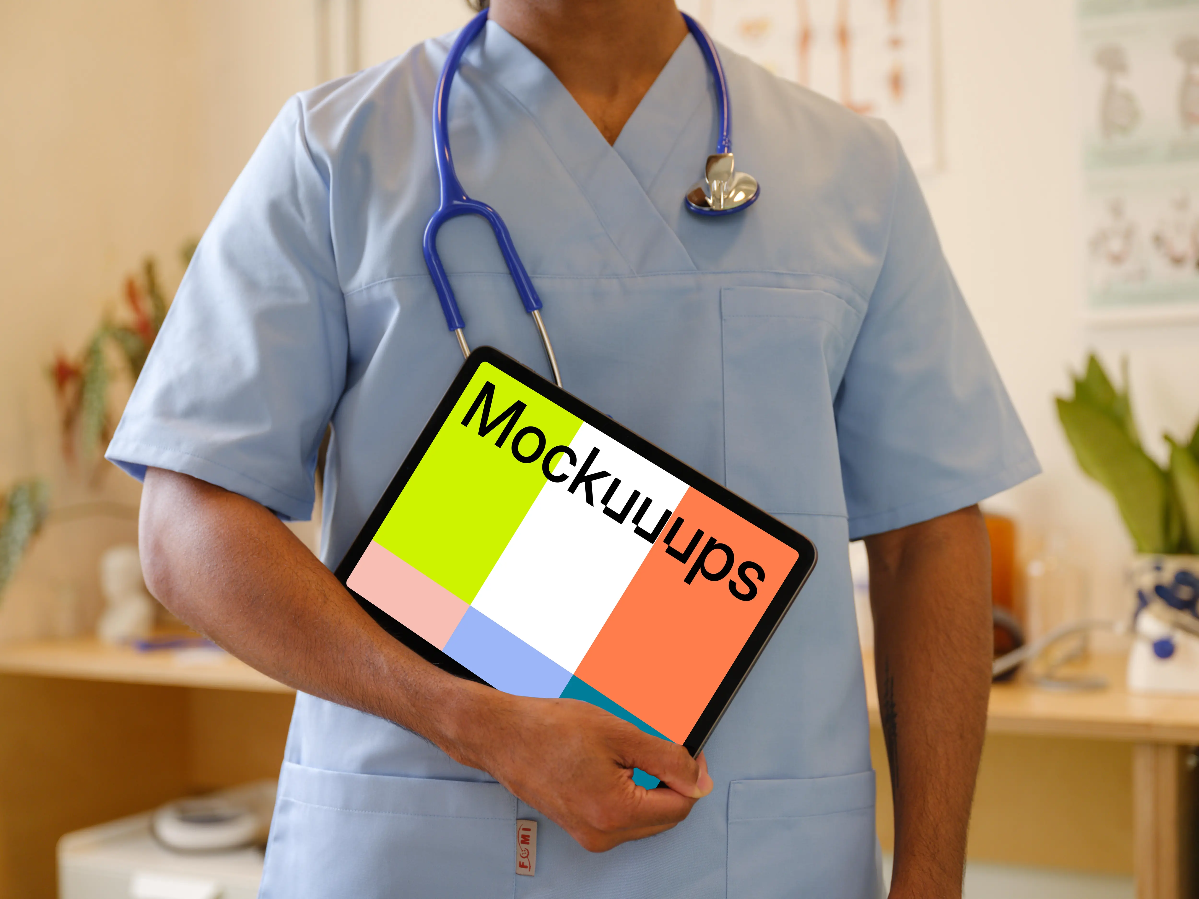 Doctor’s hand holding an iPad mockup