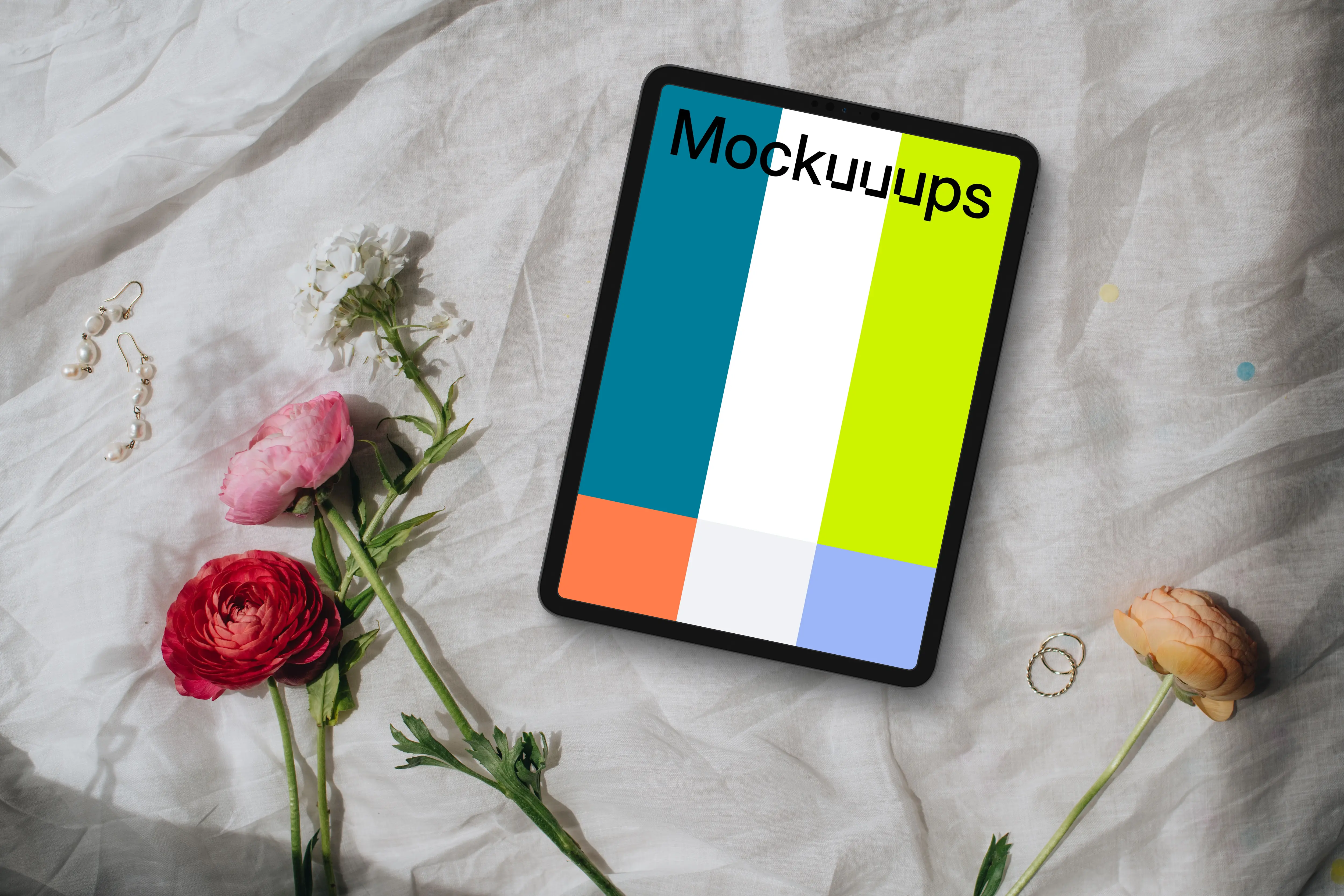 Elegantly arranged wedding setup with iPad mockup