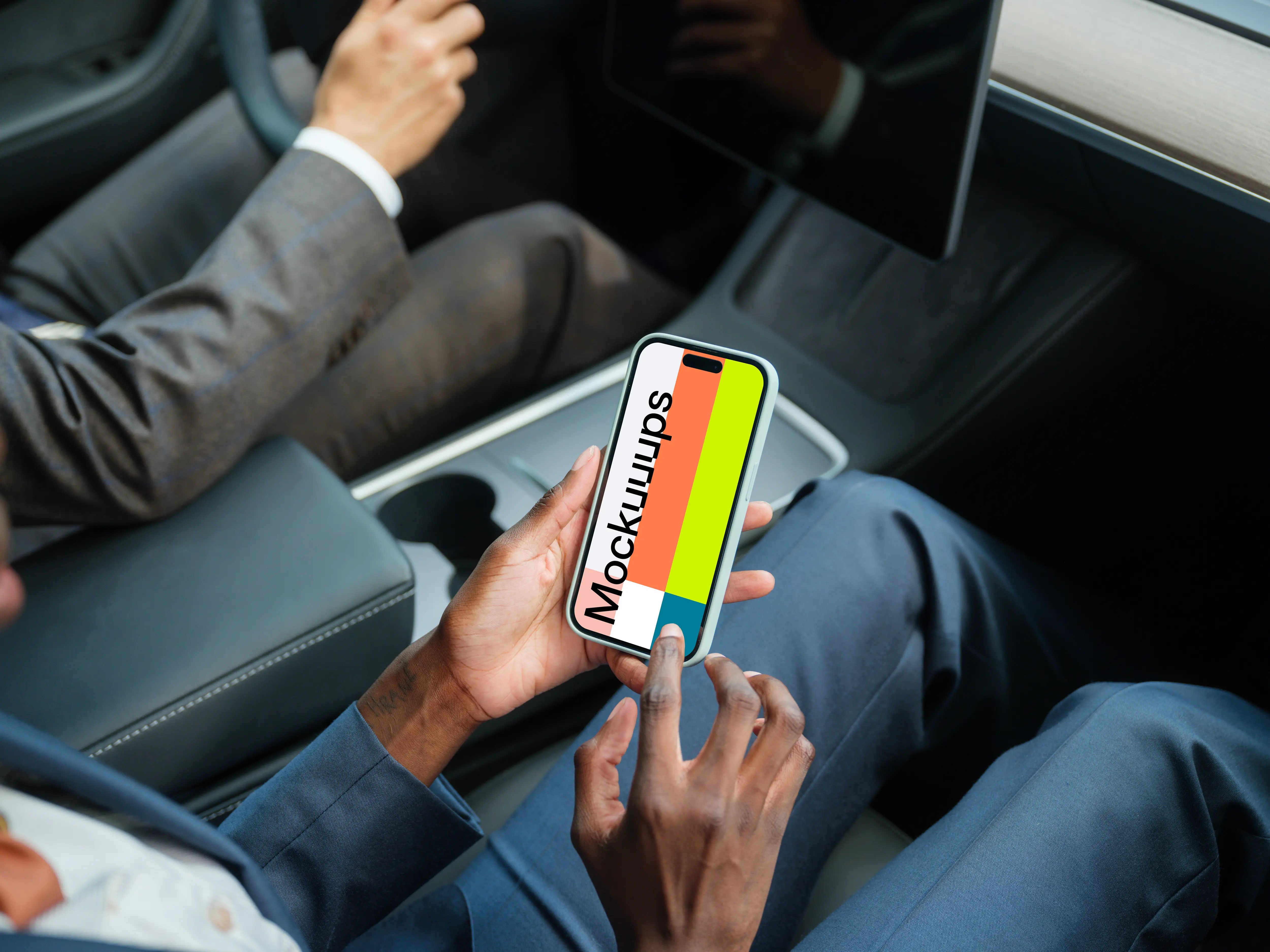 Entrepreneurs in Tesla with iPhone 14 Pro mockup