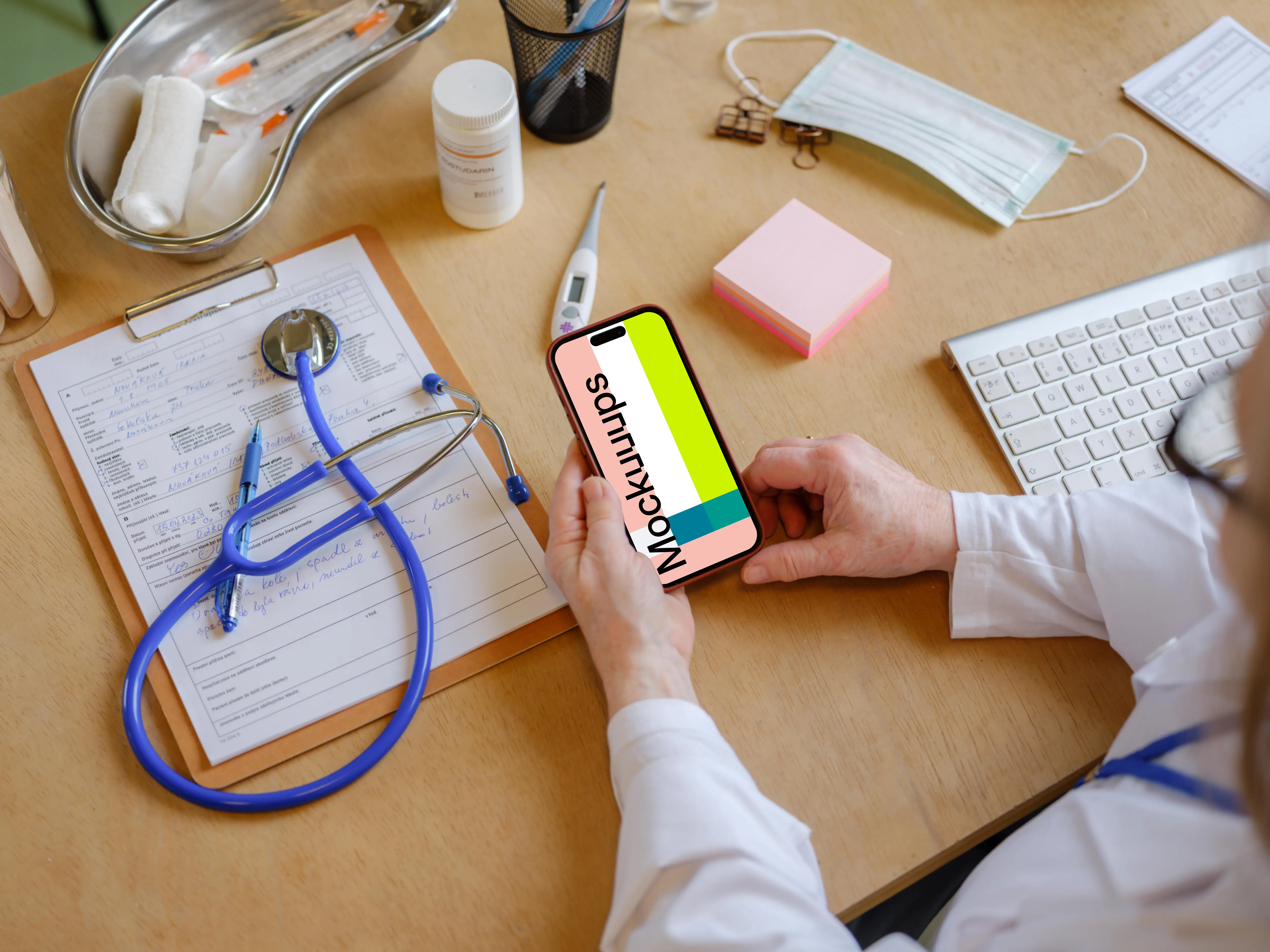 Female doctor holding an iPhone