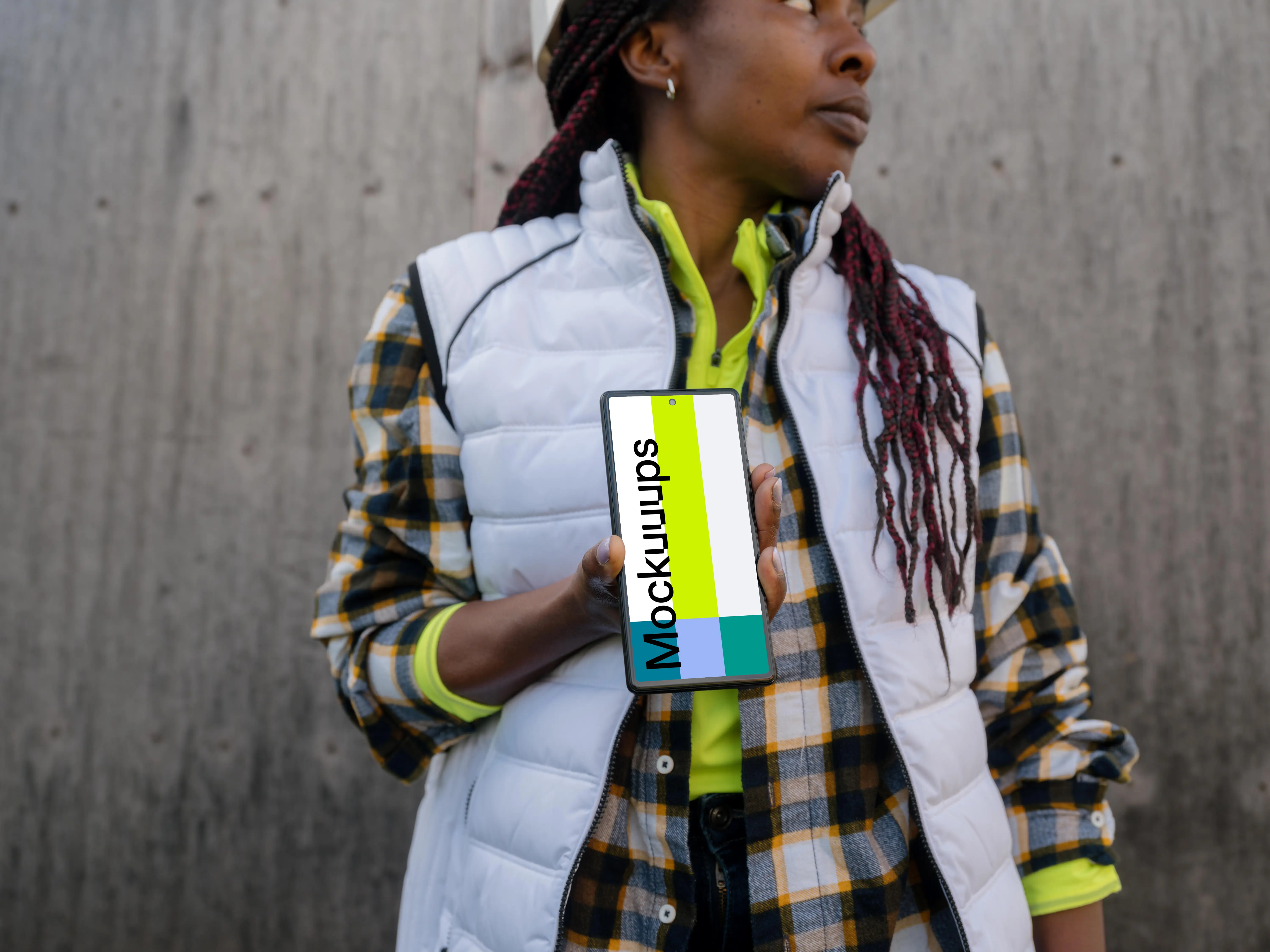 Female engineer in construction presenting Google Pixel mockup