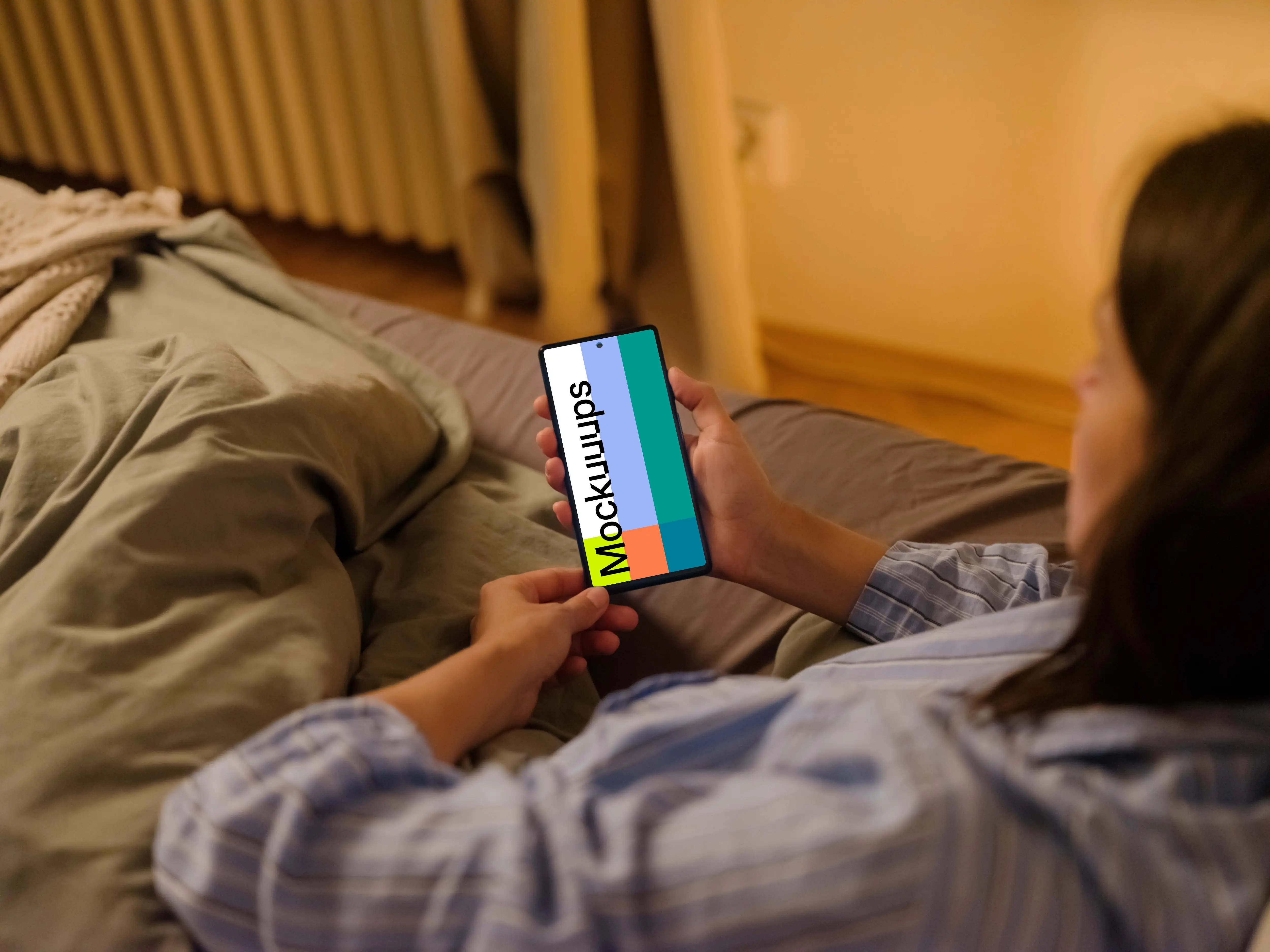 Female hand holding a phone mockup